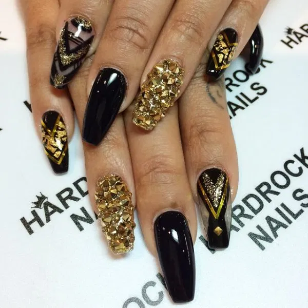 women's black and gold nails