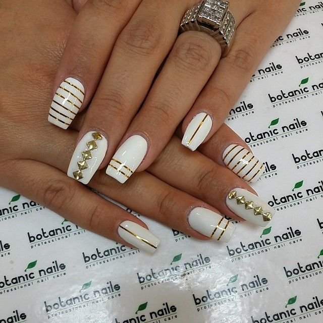 women's white and gold nails