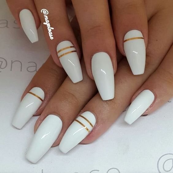 women's white and gold nails