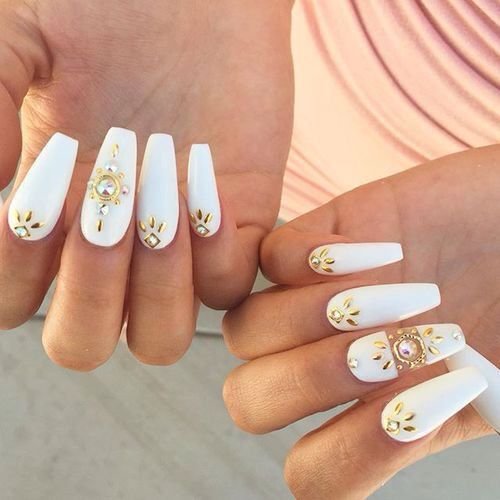 women's white and gold nails