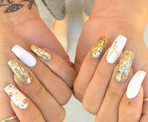 women's white and gold nails